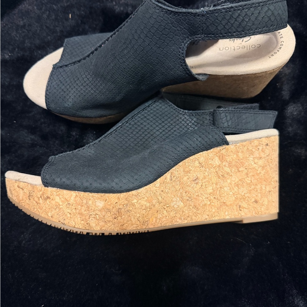 Clark’s mules never worn size 10.
